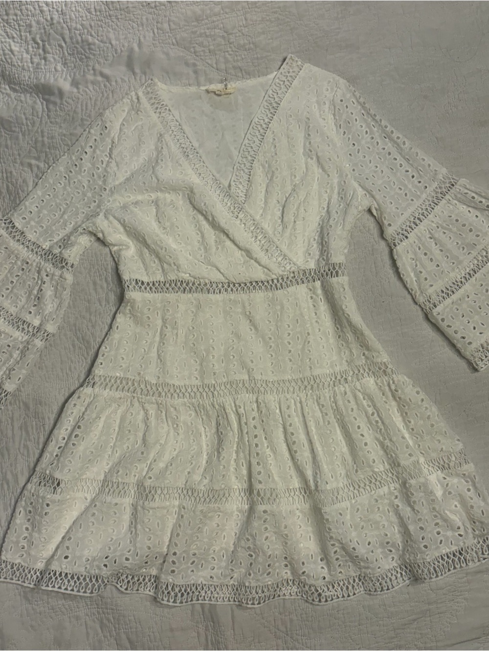Entro white eyelet lace mini dress with bell sleeves and tiered skirt, size L